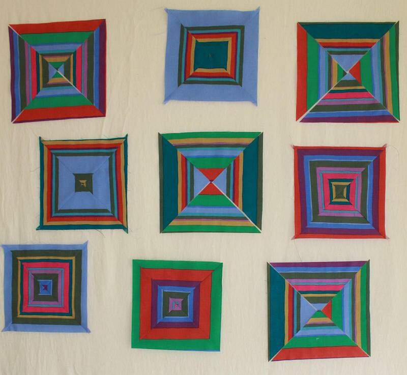 Photo of quilt blocks on quilt design wall