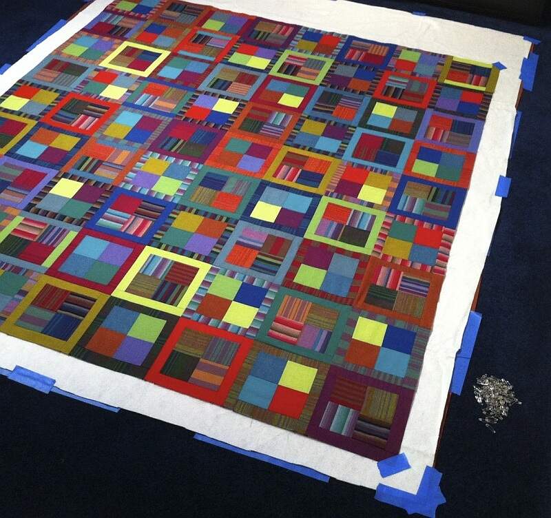 Quilt basted on floor