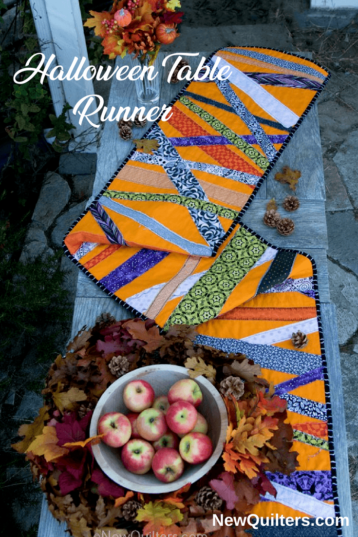 Get inspired to make a quick and easy Halloween table runner with this gallery of photos from the one we made. NewQuilters.com #halloweenquilt, #tablerunnerquilt, #tabletopperquilt