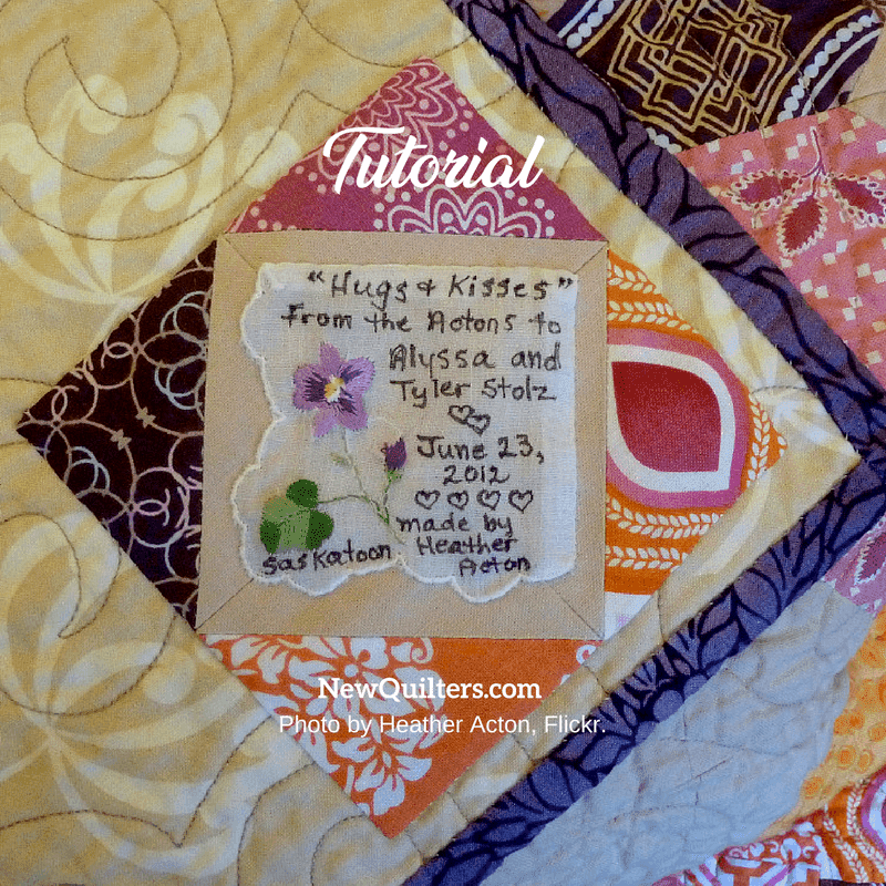Photo of quilt label with vintage handkerchief